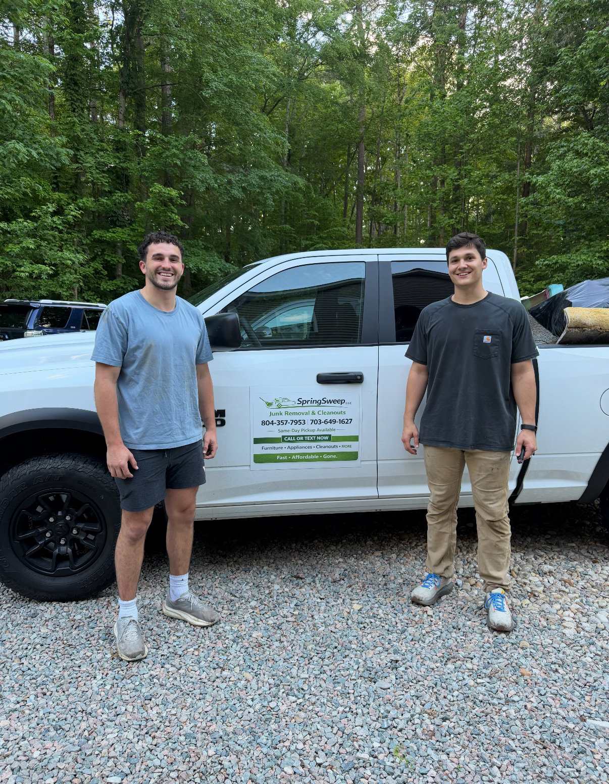 The Spring Sweep LLC team standing in front of their truck